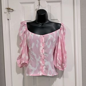 Buttoned down, off the shoulder blouse.